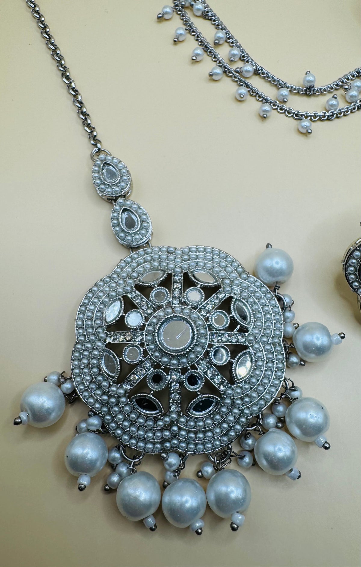 silver jhumka with tikka